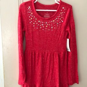 Girl dress in red color perfect for Christmas